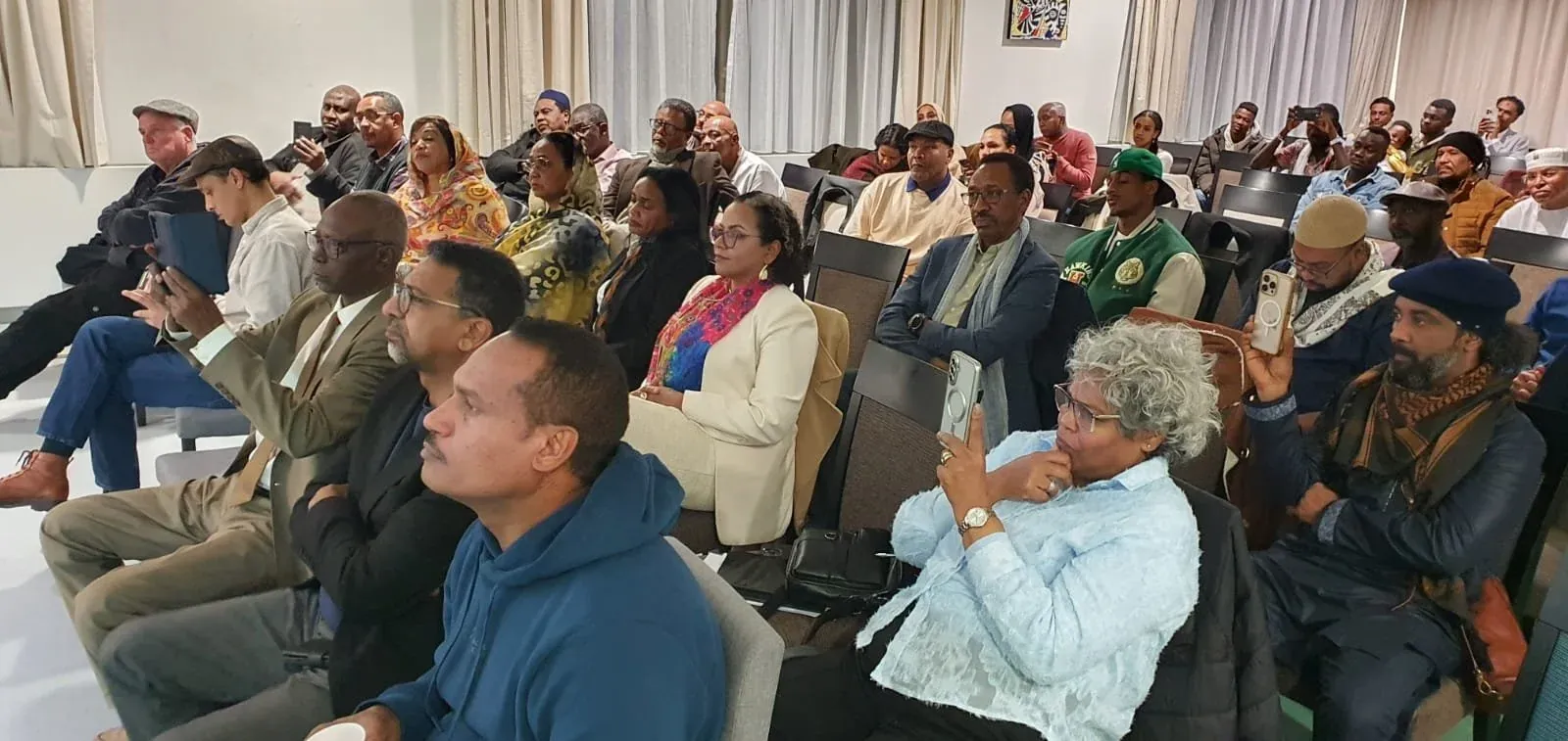 A full room of guests gathered for a cultural evening at Napata