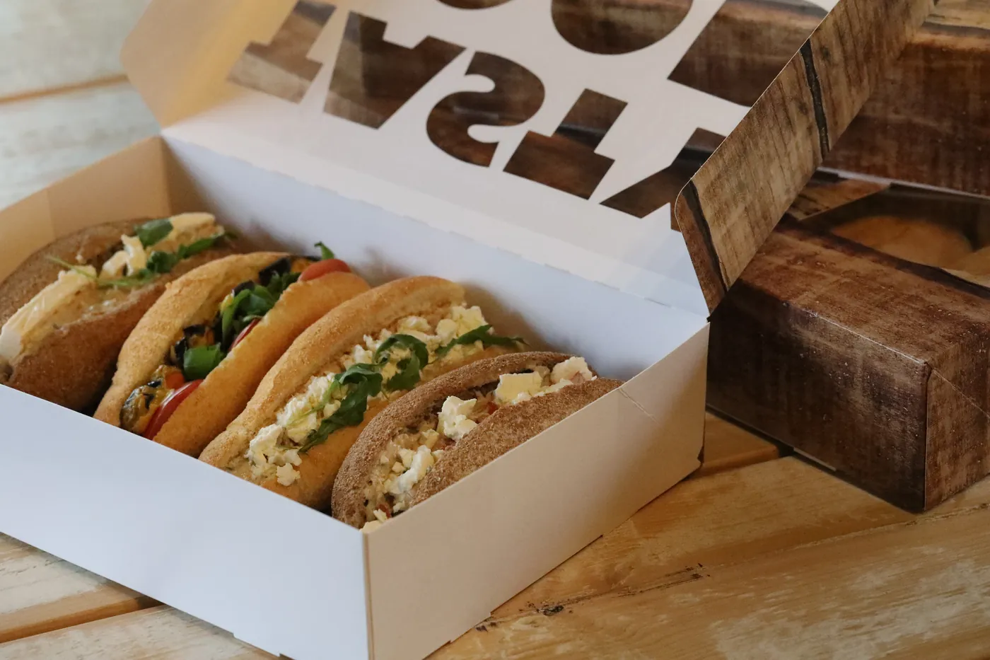 Catering boxes packed with sandwiches ready for delivery