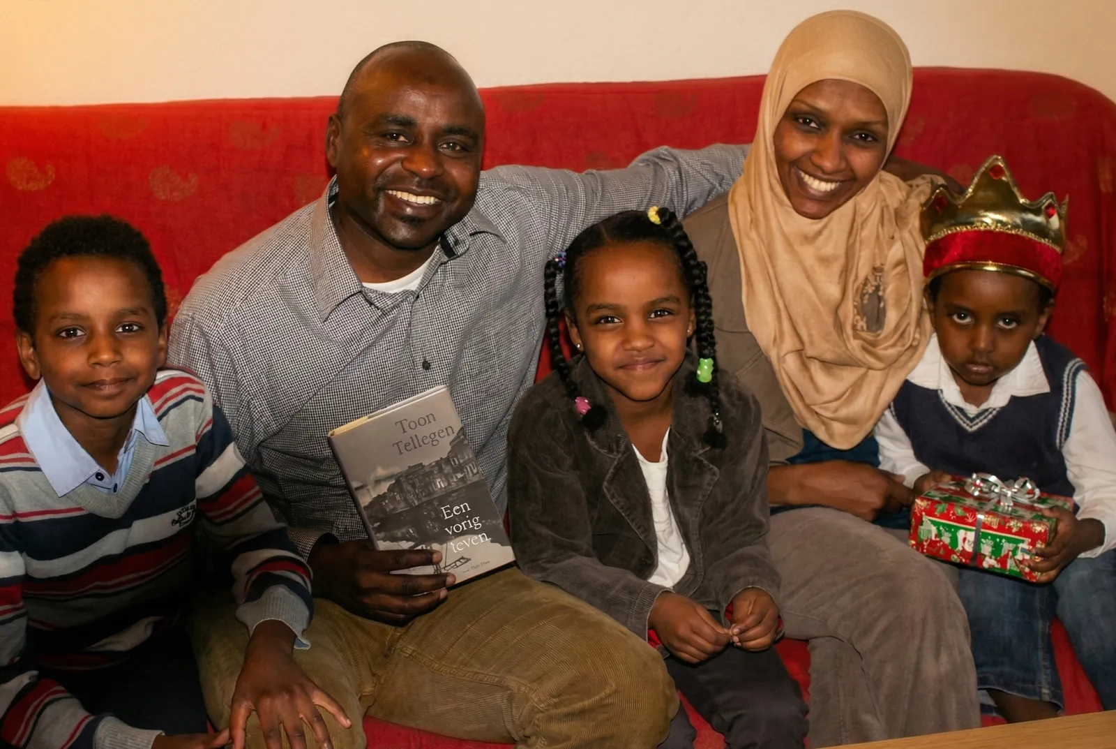 The Adam family together at home